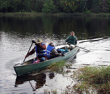 Artist Milton Paddling the Shuttle with Caren-Marie Michel and Guide, Sarah Spencer